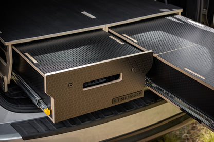 Close up shot of the Trekhaus SUV Camper Kit, showing off the drawers and material details